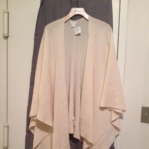 A brand new with tags cashmere peach wrap