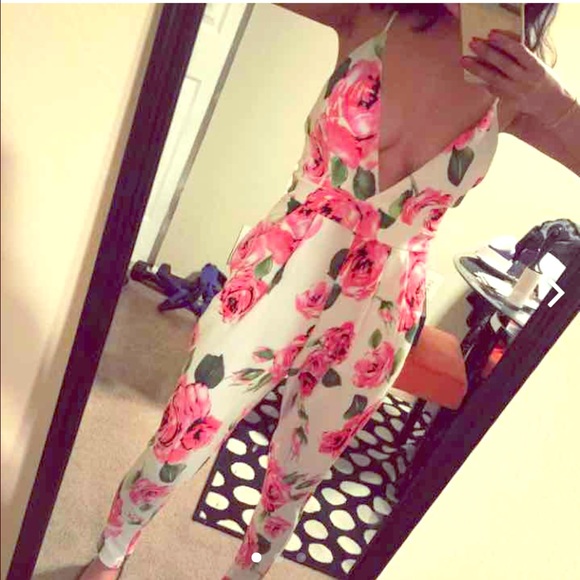 Dresses & Skirts - *Reserved*Floral Print Deep Plunge Jumpsuit Size S
