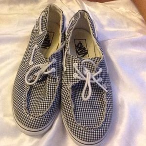 Black and white chauffeur Vans.