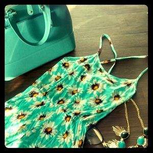 Flower jumpsuit with cris cross straps