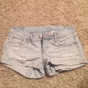 Light blue ripped denim american eagle shorts