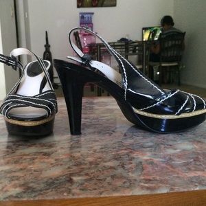Black heels with white strings