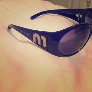 Miu Miu sunglasses.