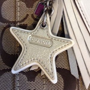 Coach gold and silver star key chain