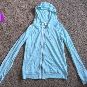 Zumiez turquoise zip down hoodie.