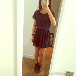 Navy blue dress with pleated skirt