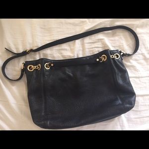 AUTHENTIC Michael Kors black leather purse.
