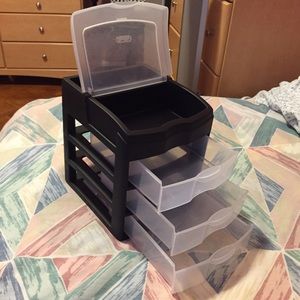 Black and clear make up holder