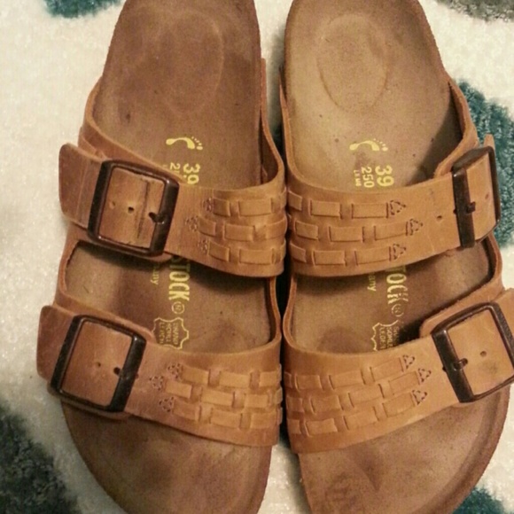 Birkenstock  woven leather arizonas.