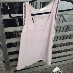 Embellished tank