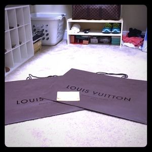 2 large Louis Vuitton bags and one small dust bag!