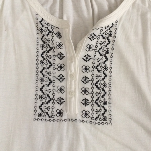 white shirt with black design - Picture 2 of 2
