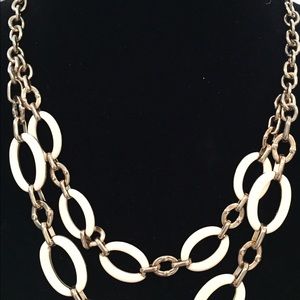White and gold link necklace and bracelet