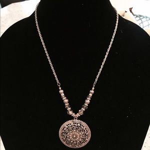 Fun gold necklace with 2" medallion
