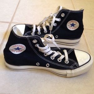 Black and white converse high tops