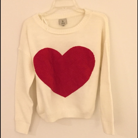 White sweater with heart