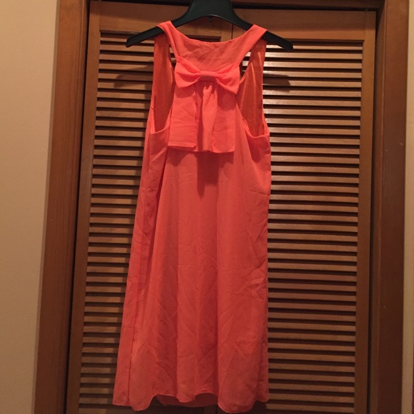 Brand new! Never worn! Bow-back dress in coral.