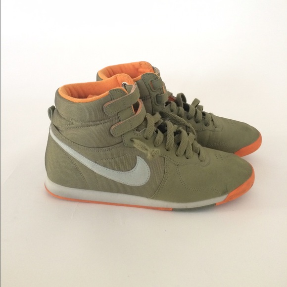green and orange nike shoes