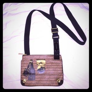 L.A.M.B cross body purse.