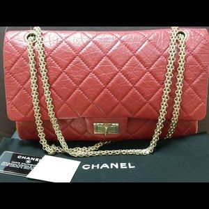 Chanel reissue 227 calfskin in red gold cc