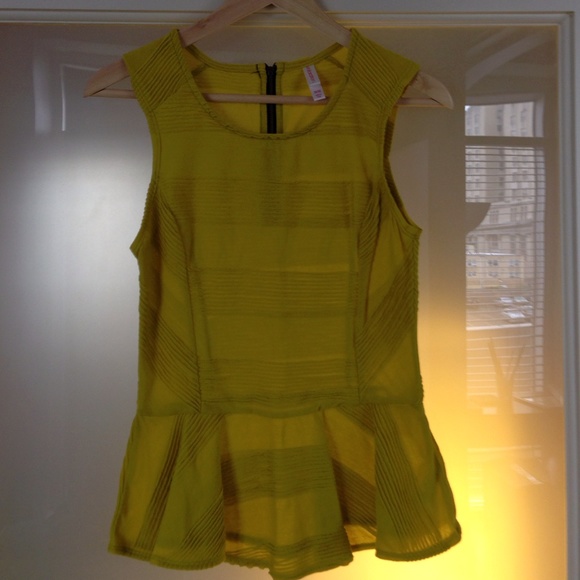 Chartreuse (yellow-green) peplum top