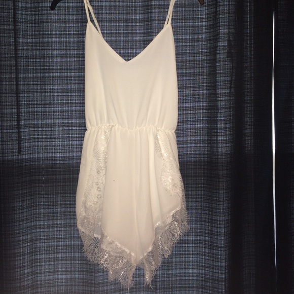 Summer white romper with lace detail