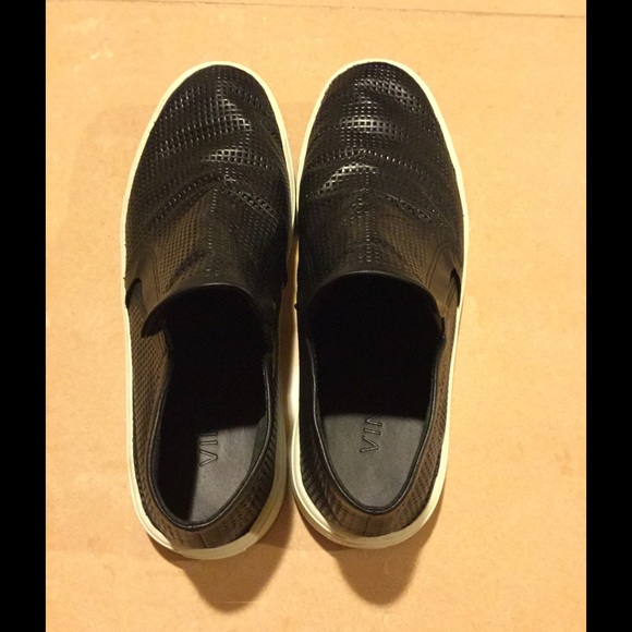 Black slip-on sneakers