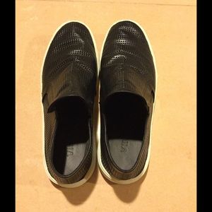 Black slip-on sneakers