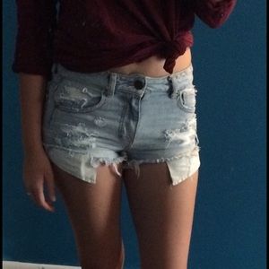 High waisted light colored denim shorts