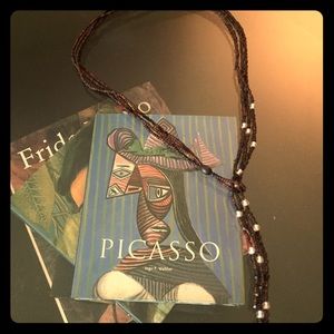 Brown bead lasso necklace