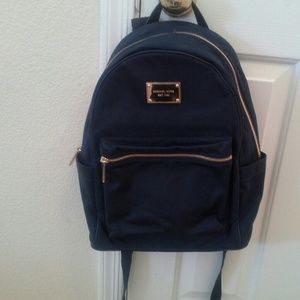 Michael Kors blue backpack