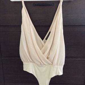 Cream sleeveless bodysuit, NWT