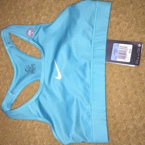 Bundle of 4 Nike sport bras.
