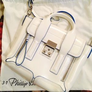 The Pashli Mini Patent-Leather Trapeze Bag