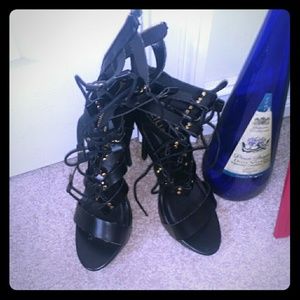 Strapped heeled lace up sandals sandals