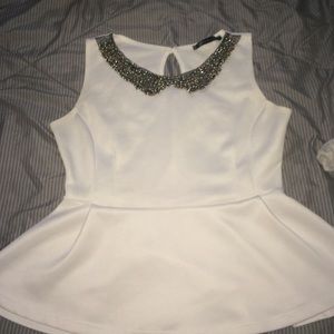 Peplum shirt with embroidered collar
