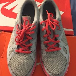 Pink and gray Nike sneakers