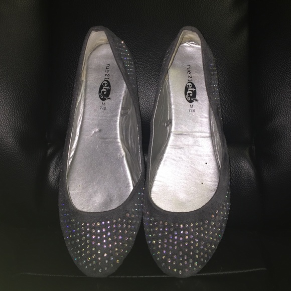 Gray crystal studded flats.