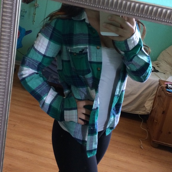 Green, blue, and light pink flannel
