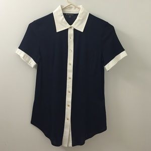 Navy button down shirt with white trims