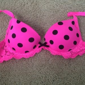 neon pink and black polka dot bra