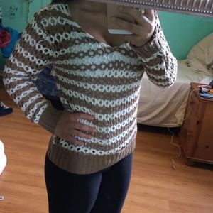 Light brown and cream colored knitted sweater