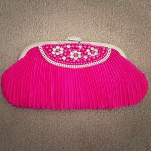 Hot pink clutch
