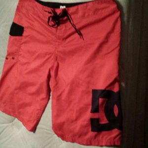 Male: red DC swim trunks