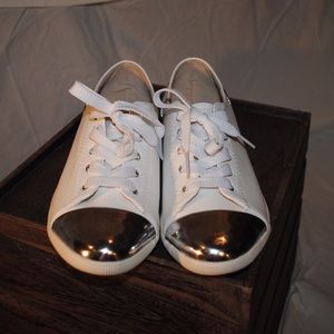 White leather sneakers with metal details