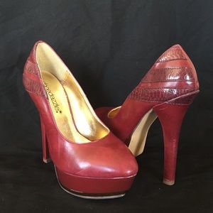 Maroon platform heels with gold detail