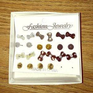 Variety of silver, gold, & bronze earrings