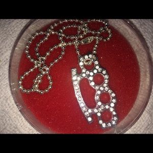 Brass knuckle necklace