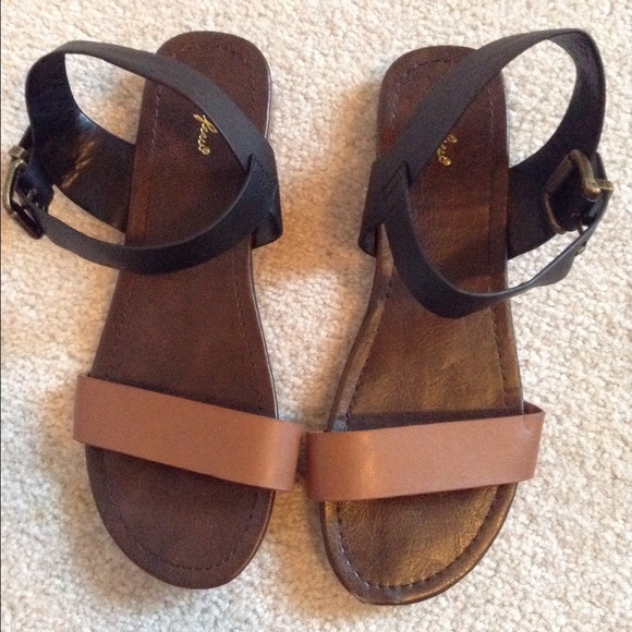 Brown and black strapped sandals