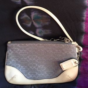 Light blue vintage logo Coach wristlet